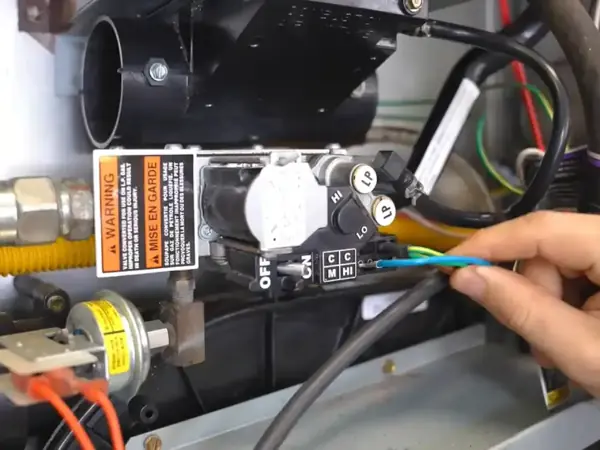 Hand wiring a gas valve and controls on a heating appliance
